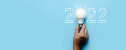 social media marketing in 2022, lighting bulb with new year number on blue background